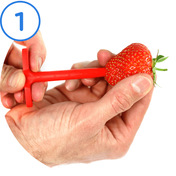 1. Lining up huller with center of strawberry