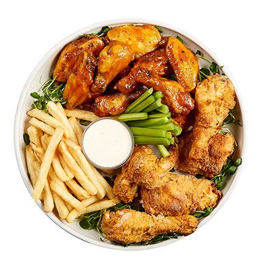 Platter of chicken winds and fries