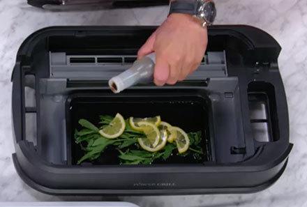 Add Herbs & Liquid Smoke to Flavor Salmon & Asparagus During Cooking