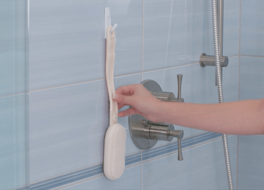Handle features hole for easy hanging on shower hooks