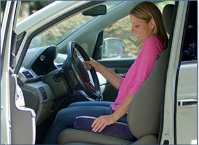 woman sitting in car