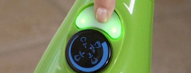 A finger pressing the easy to use one-touch button