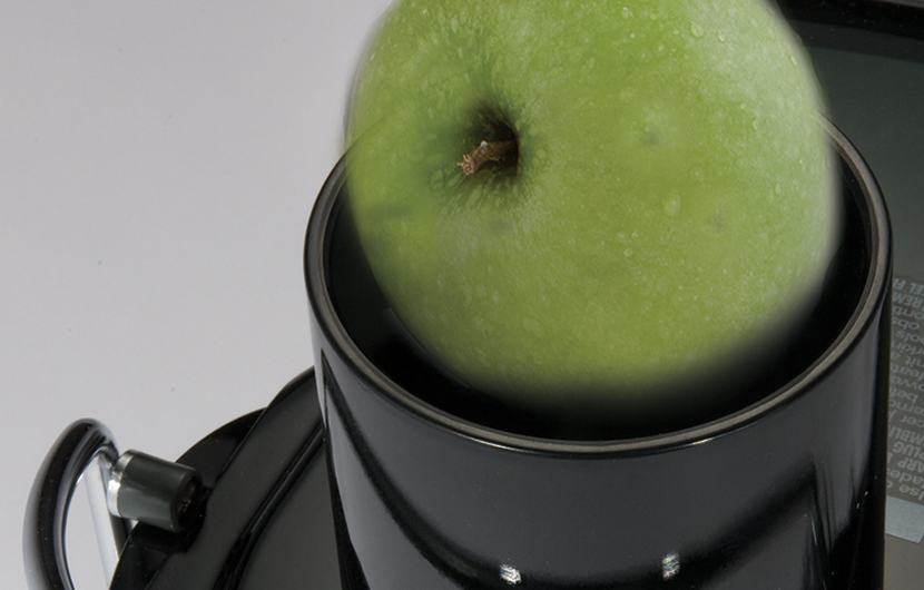 juicer with extra large chute - apple in chute