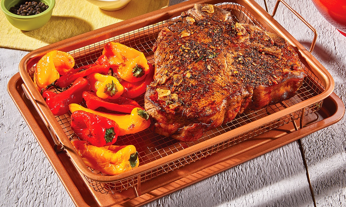 steak and vegetables on copper crisper
